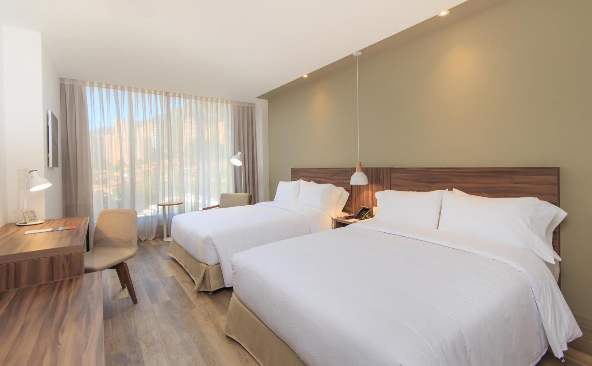 Novotel Medellin El Tesoro Экстерьер фото A room at the hotel