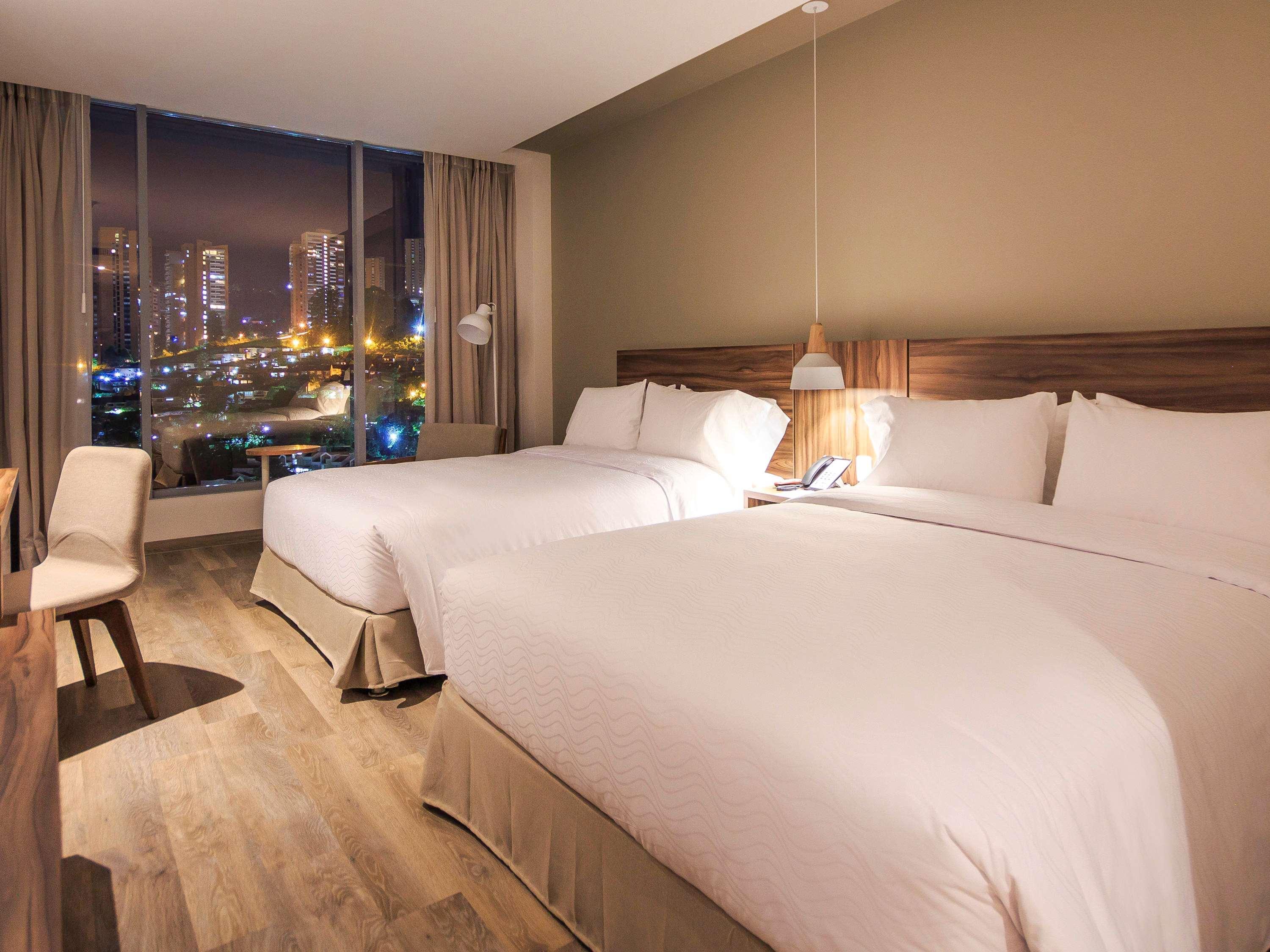 Novotel Medellin El Tesoro Экстерьер фото A room at the hotel