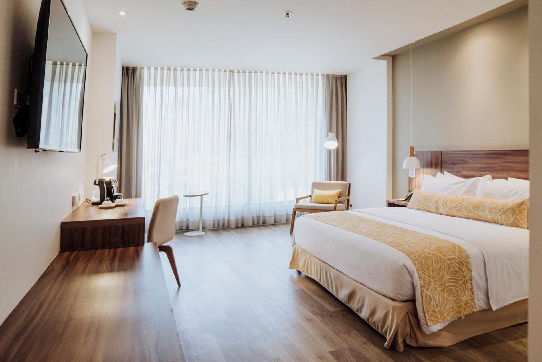 Novotel Medellin El Tesoro Экстерьер фото A room at the hotel
