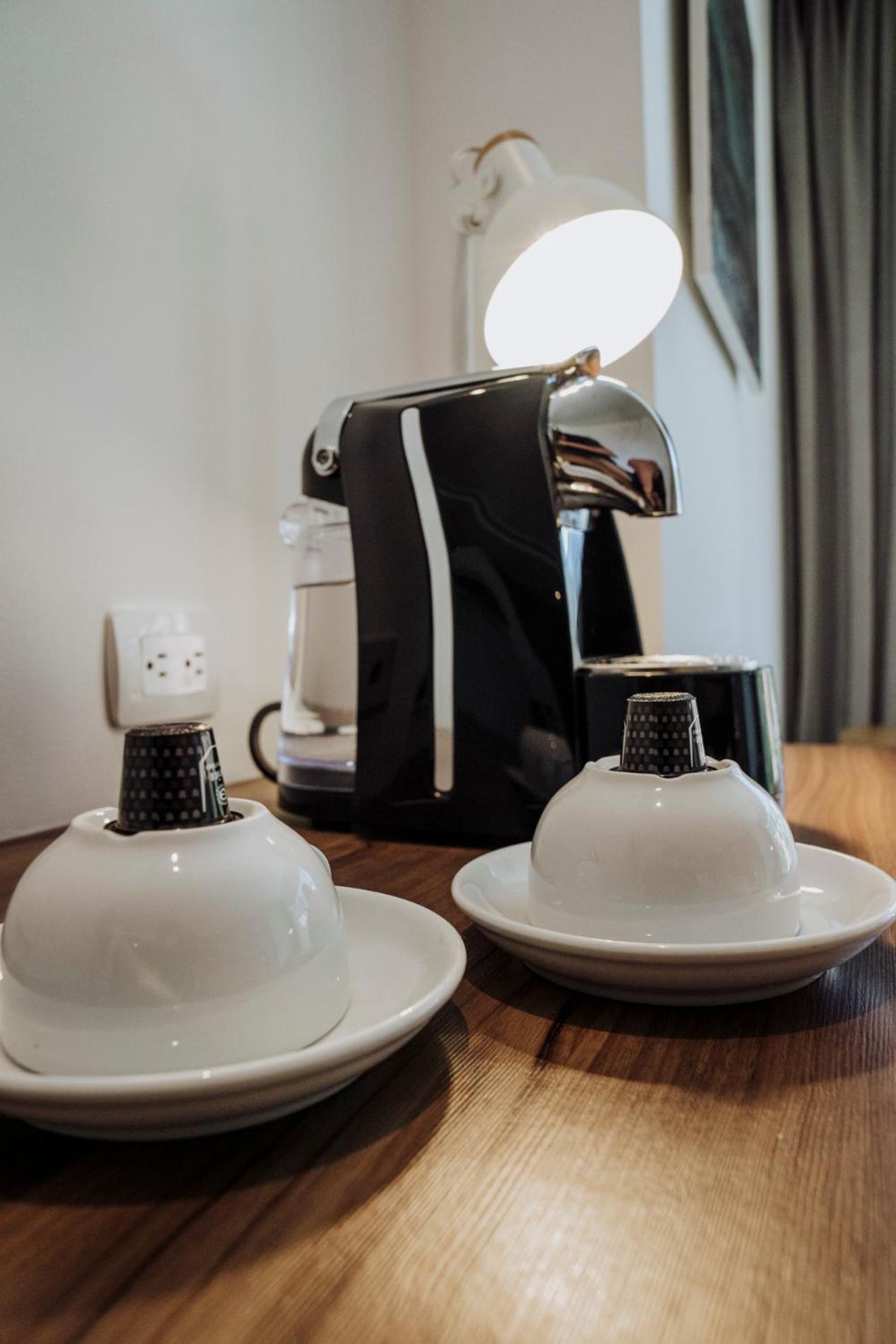 Novotel Medellin El Tesoro Экстерьер фото A Nespresso coffee machine