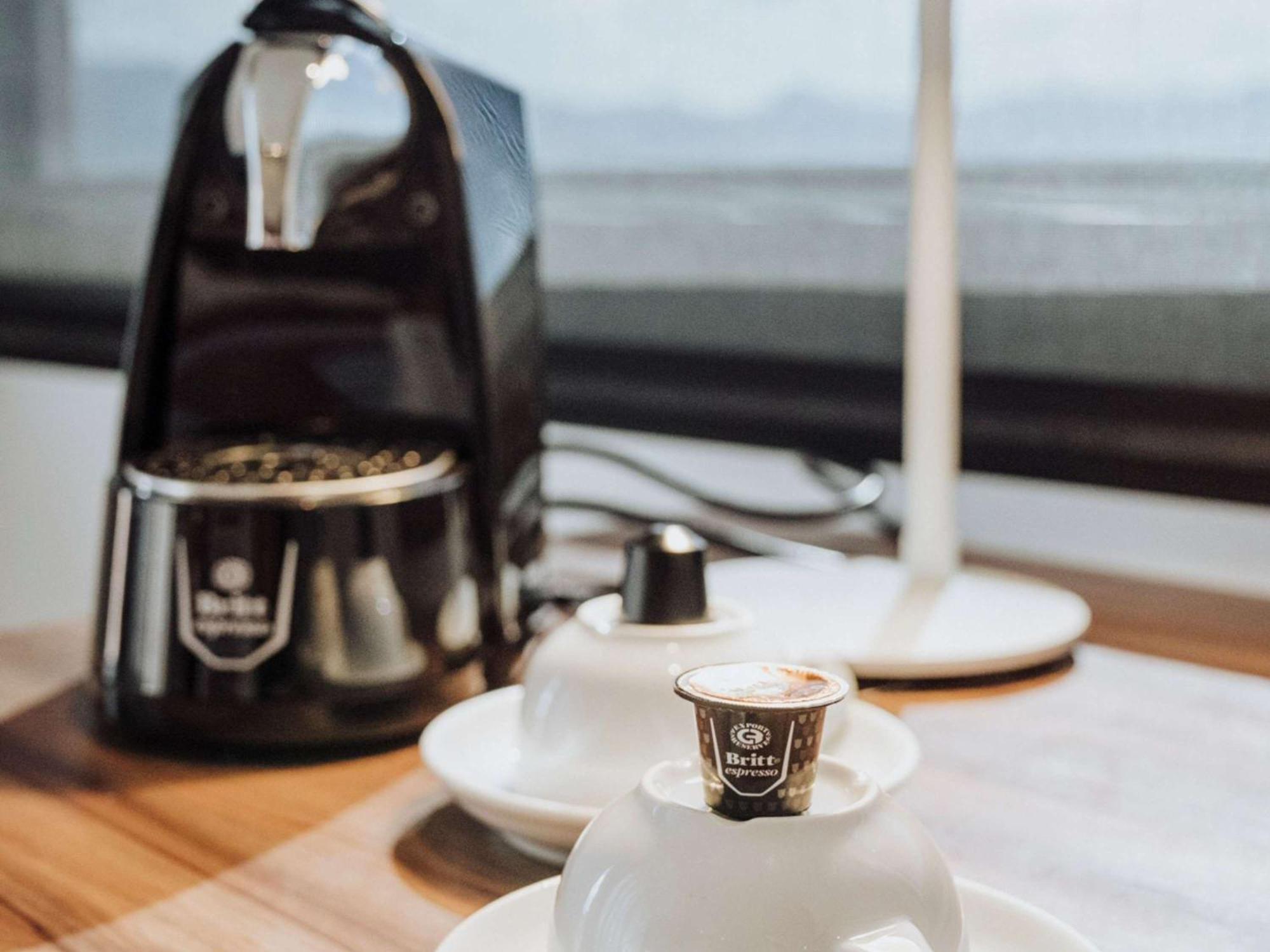 Novotel Medellin El Tesoro Экстерьер фото A coffee machine