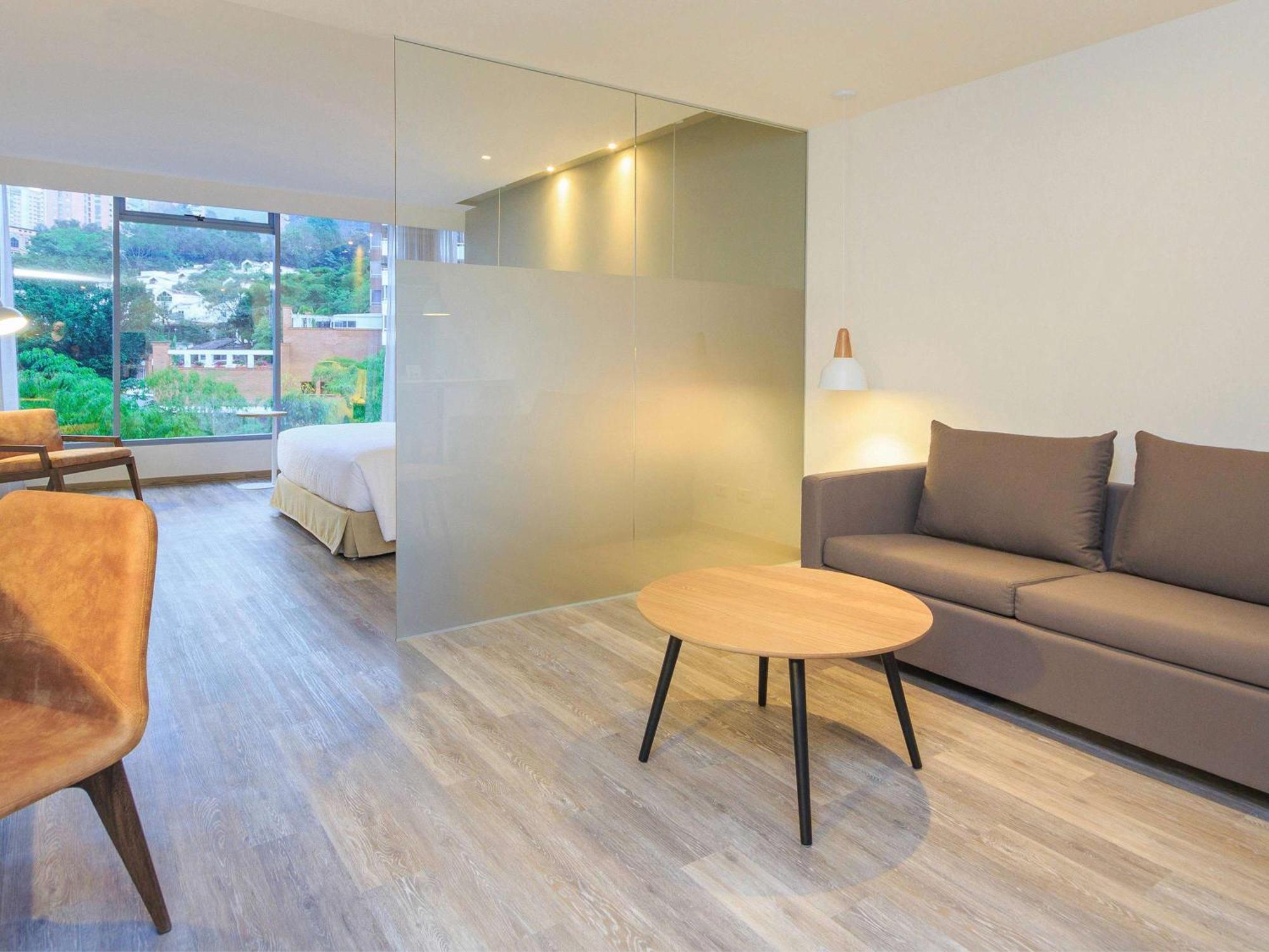Novotel Medellin El Tesoro Экстерьер фото A room at the hotel