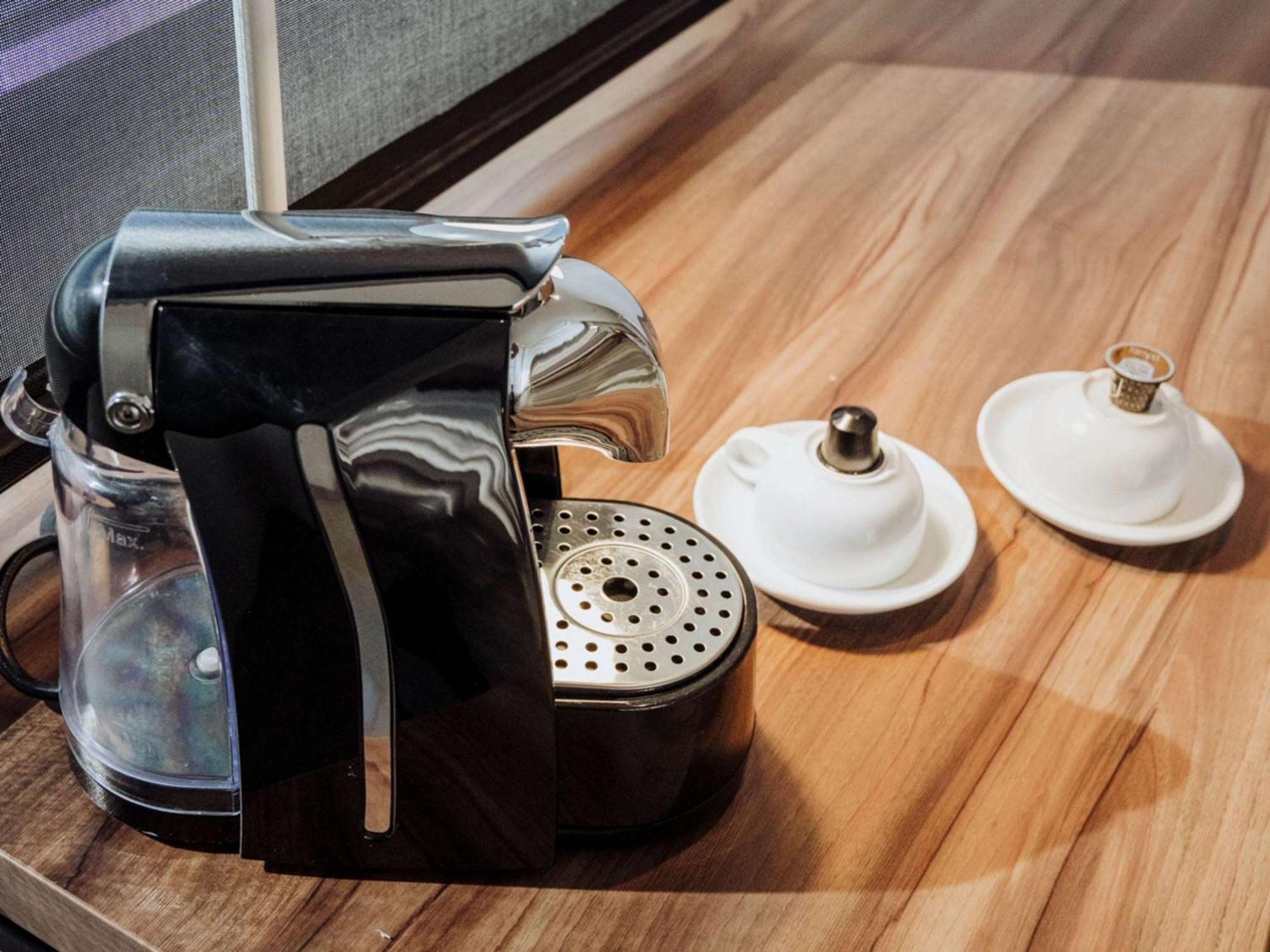 Novotel Medellin El Tesoro Экстерьер фото A Nespresso coffee machine