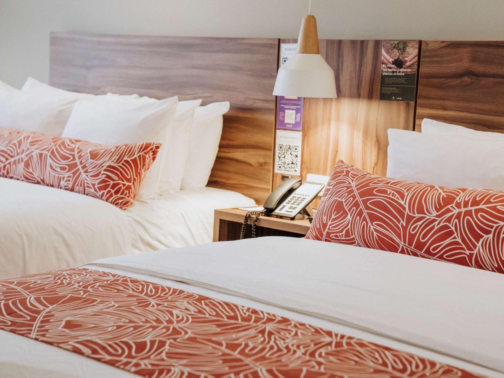 Novotel Medellin El Tesoro Экстерьер фото A room at the hotel